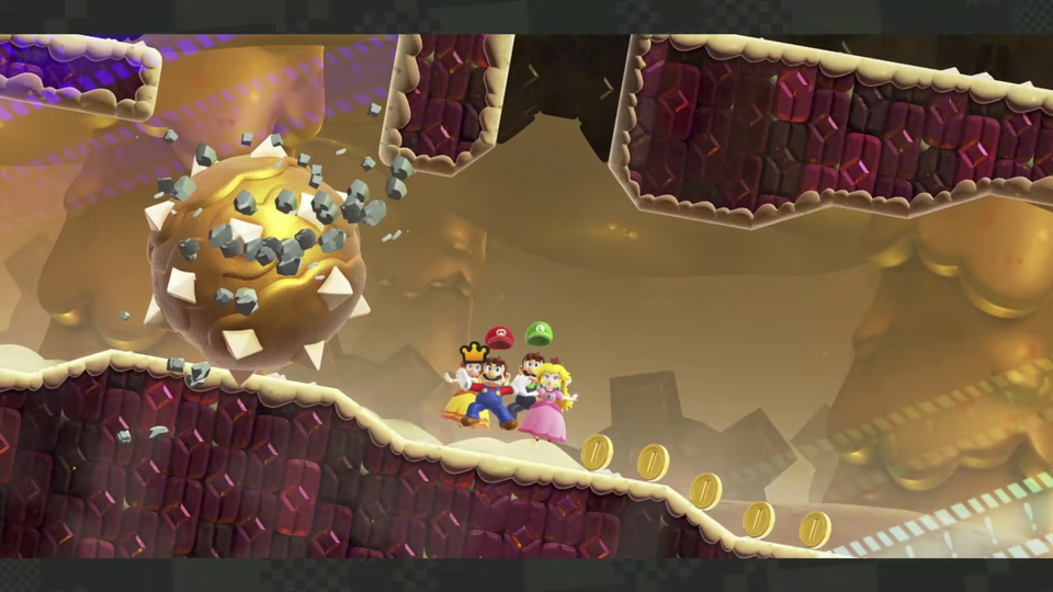 Mario en zijn vrienden in een level van Super Mario Bros. Wonder.
