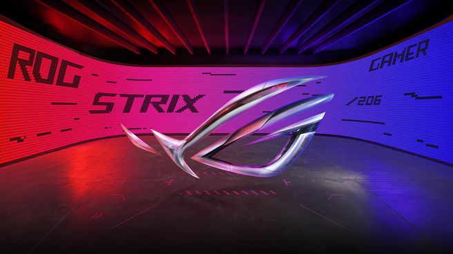 Zilveren ROG-logo voor een rood en blauw verlichte wand met de tekst ROG Strix.