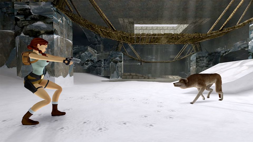 Lara Croft richt haar pistolen op een wolf in een besneeuwde grot met een houten brug.