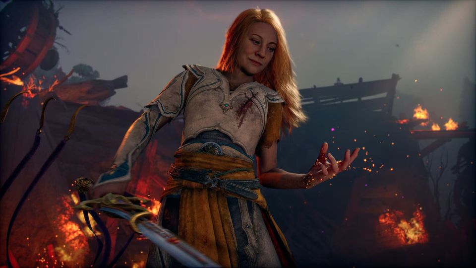 Laufey met een wapen in de hand tussen brandende resten van een dorp.